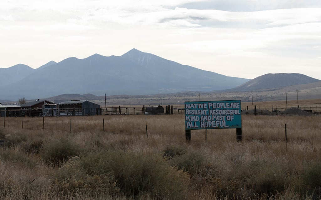 A series of turquoise signs along southbound U.S. 89 near Tuba City proclaims the Navajo Nation's resiliency amid the COVID-19 pandemic. (File photo by Sierra Alvarez/Cronkite News)