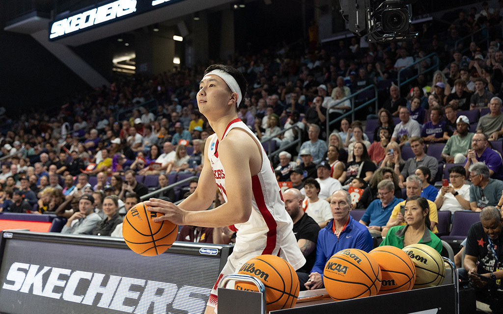 Keisei Tominaga showcases his sharpshooting as he clinches victory in the three-point competition at GCU during the State Farm College Dunk & 3-Point Championships. (Photo by Noah Maltzman/Cronkite News)