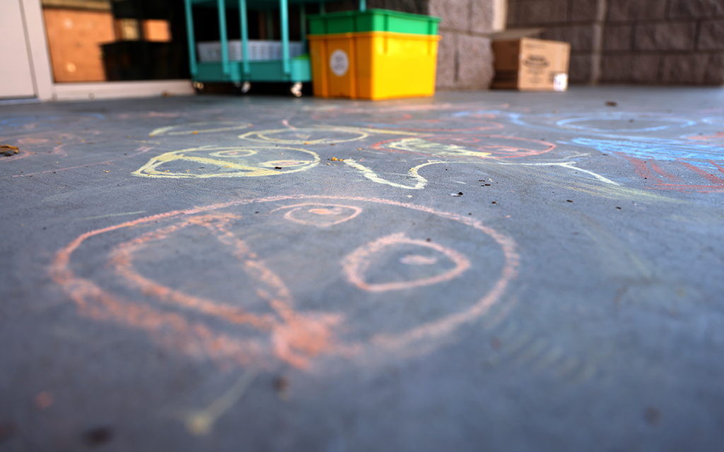 Chalk drawings outside of Imagination Childcare and Preschool in Litchfield Park on April 2. (Photo by Kevinjonah Paguio/Cronkite News)