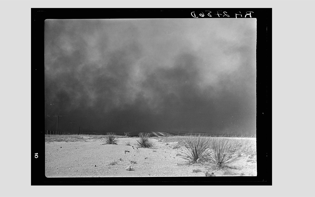 Heavy black clouds of dust rising over the Texas Panhandle, Texas in 1936. (Photo courtesy of Library of Congress, Prints & Photographs Division)