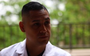 Dr. Jesus Guzman, a research fellow in gastroenterology, remembers the struggles he experienced while pursuing his medical education.  (Photo by Jack Orleans/Cronkite News)