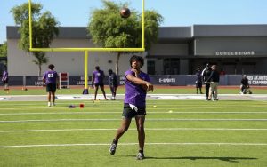 Desert Edge High School quarterback Elijah Sherbin-Fox shows off his throwing skills during Arizona’s first HBCU Football Camp at Higley High School in Gilbert, Arizona, on Saturday. (Photo by Joshua Heron/Cronkite News)