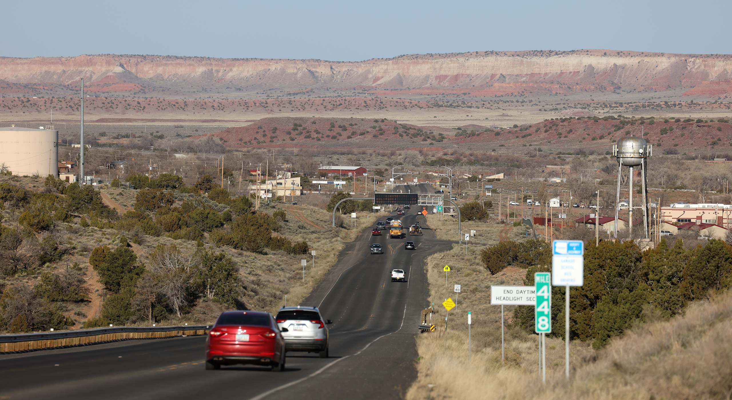 Cars travel west on Highway 264 toward Ganado, population 883 as of 2020. (Photo by Kevinjonah Paguio/Cronkite News)
