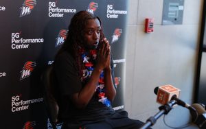 Phoenix Mercury guard Kahleah Copper is overcome with emotion after being named to her first Olympic roster on June 11 at the Verizon 5G Performance Center in Phoenix. (Photo by Grace Hand/Cronkite News)