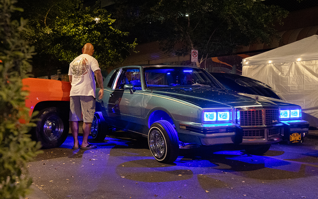 Lowriders leave for the night as the second Saturday of the month car show comes to a close in downtown Phoenix on April 13, 2024. (Photo by <a href="https://cronkitenews.azpbs.org/people/david-ulloa-jr/" rel="noopener" target="_blank">David Ulloa Jr.</a>/Cronkite News)