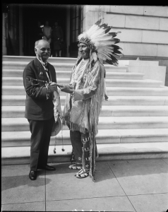 Vice President Charles Curtis receives a peace pipe from Chief Red Tomahawk on June 21, 1929, in Washington, D.C. (Photo courtesy of Library of Congress)