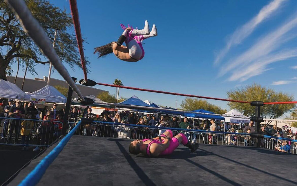 Professional wrestler Freddy Cordova soars above the competition at a Phoenix Championship Wrestling event, preparing for a big splash. (Photo courtesy of Bo Rancho Photos)