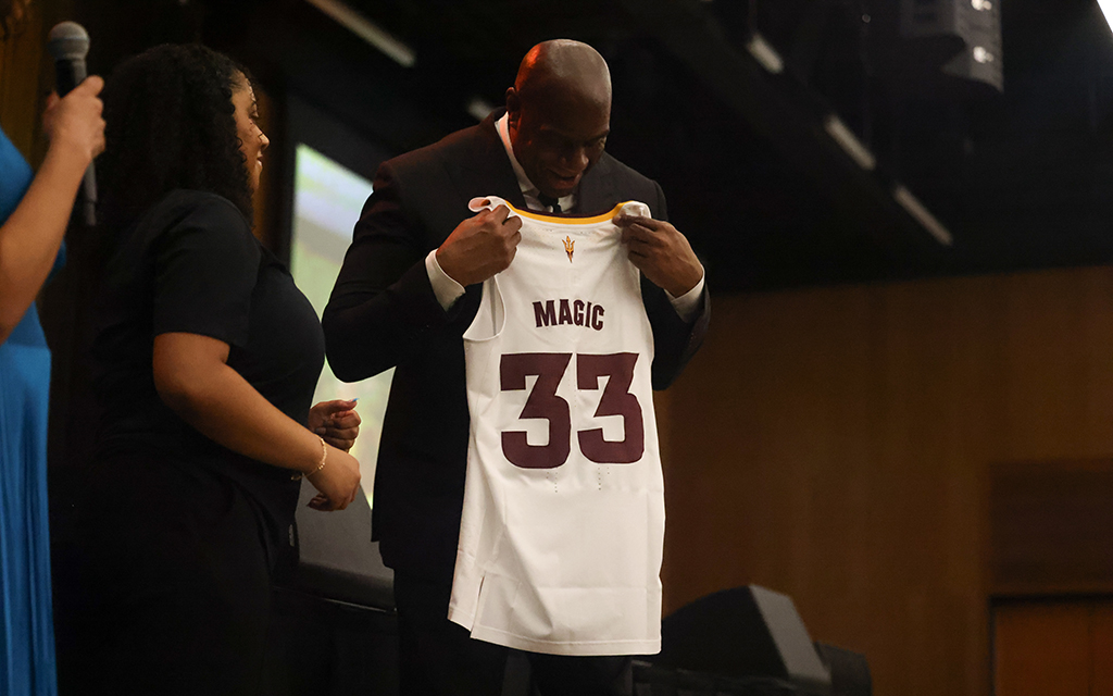 Magic Johnson receives an honorary jersey presented by ASU's Black African Coalition members. (Photo by Shirell Washington/Cronkite News)