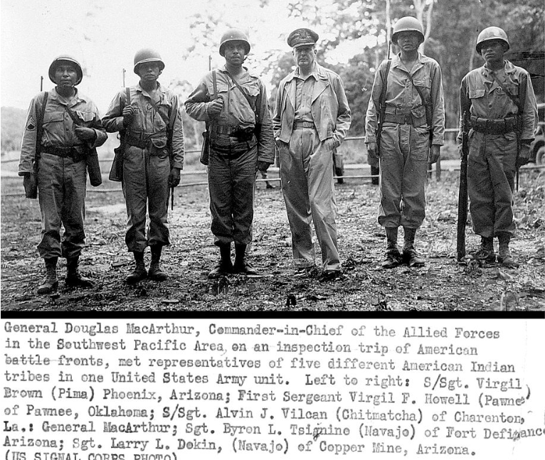 General Douglas MacArthur, who commanded the Allied forces in the Southwest Pacific Area, with representatives from five Native American tribes in 1943. (Photo courtesy of U.S Signal Corps)