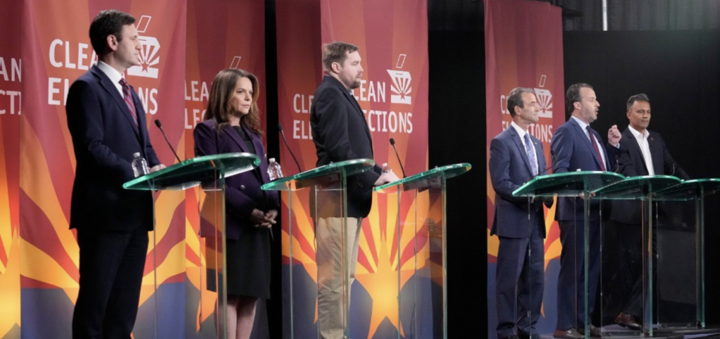 From left, Andrei Cherny, Marlene Galán-Woods, Andrew Horne, Kurt Kroemer, Conor O’Callaghan and Amish Shah speak at an Arizona Citizens Clean Elections Commission debate in May. (Photo courtesy of Citizens Clean Elections Commission)