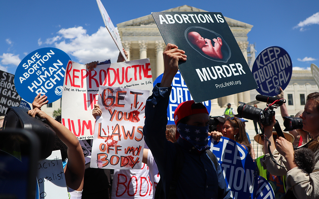 Abortion rights activists and opponents face off at the Supreme Court in Washington, D.C., on June 24, 2024. (Photo by Morgan Kubasko/Cronkite News)