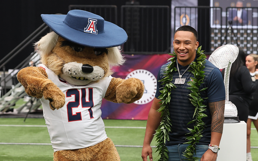 University of Arizona linebacker Jacob Manu speaks to reporters in Las Vegas about the academic challenges of increased travel in the Big 12 Conference. (Photo by Joshua Heron/Cronkite News)