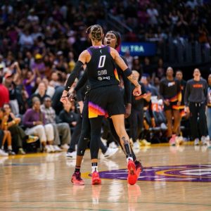 Natasha Cloud (left) and Kahleah Copper (right), both Philadelphia natives, celebrate a pivotal moment Sunday in the Phoenix Mercury's 84-78 victory against the Los Angeles Sparks. (Photo courtesy of Phoenix Mercury)