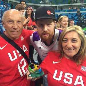 Mario Taurasi, left, Anders Andersson, middle, and Liliana Taurasi celebrate at the 2016 Rio Olympics, highlighting the global reach of WNBA stars like Diana Taurasi and the international appeal of women's basketball. (Photo courtesy of Anders Andersson)