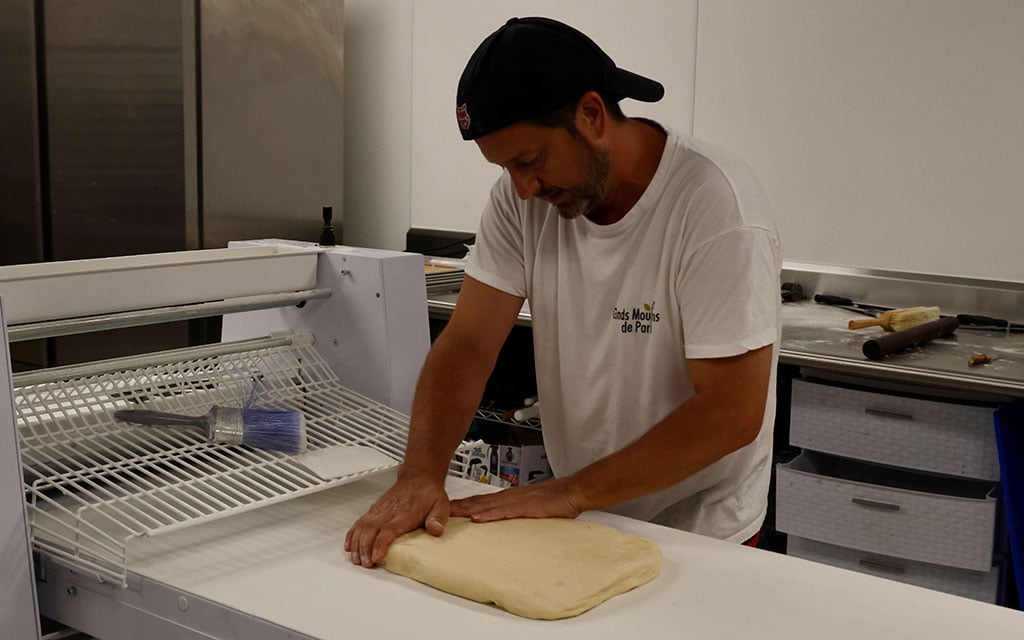 Nathas Kraus, the owner of La Belle Vie Bakery in Scottsdale, begins working on the pastries that keep customers coming back for more. (Photo by Abigail Scott/Special for Cronkite News)