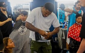 ASU football running back DeCarlos Brooks gives back to his community in his second annual Cutback Giveback Haircut Event. (Photo by Shirell Washington/Cronkite News)
