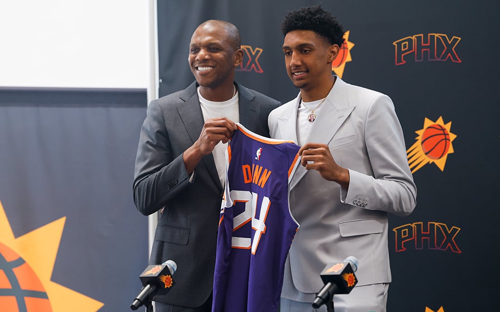 James Jones, the Phoenix Suns’ president of basketball operations and general manager, presents 28th overall pick Ryan Dunn with his jersey Tuesday. (Photo by Shirell Washington/Cronkite News)