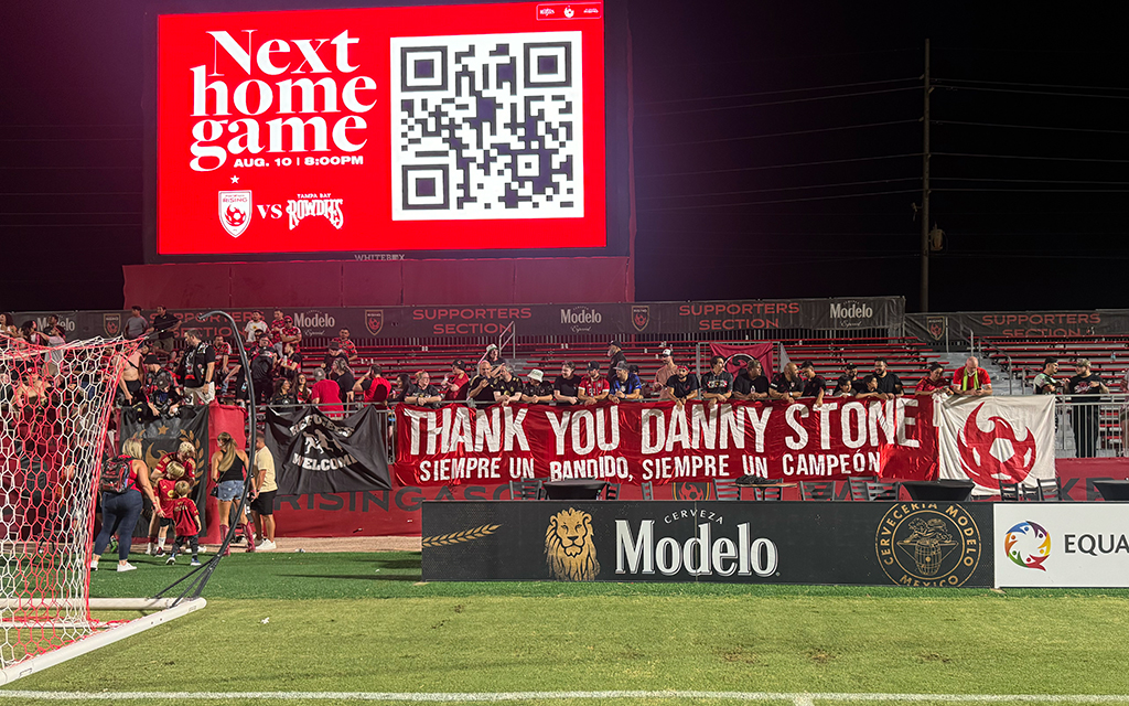 Los Bandidos, Phoenix Rising's loyal supporters group, display banners thanking former head coach Danny Stone for his dedication and contributions. (Photo by Jack Reeves/Cronkite News)