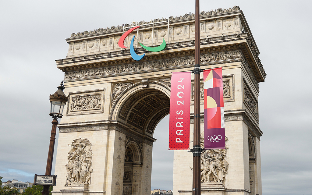 The three colored Agitos, a symbol of the Paralympic Movement, are displayed on the Arch de Triomphe in Paris. (Photo by Sydney Lovan/Special for Cronkite News)