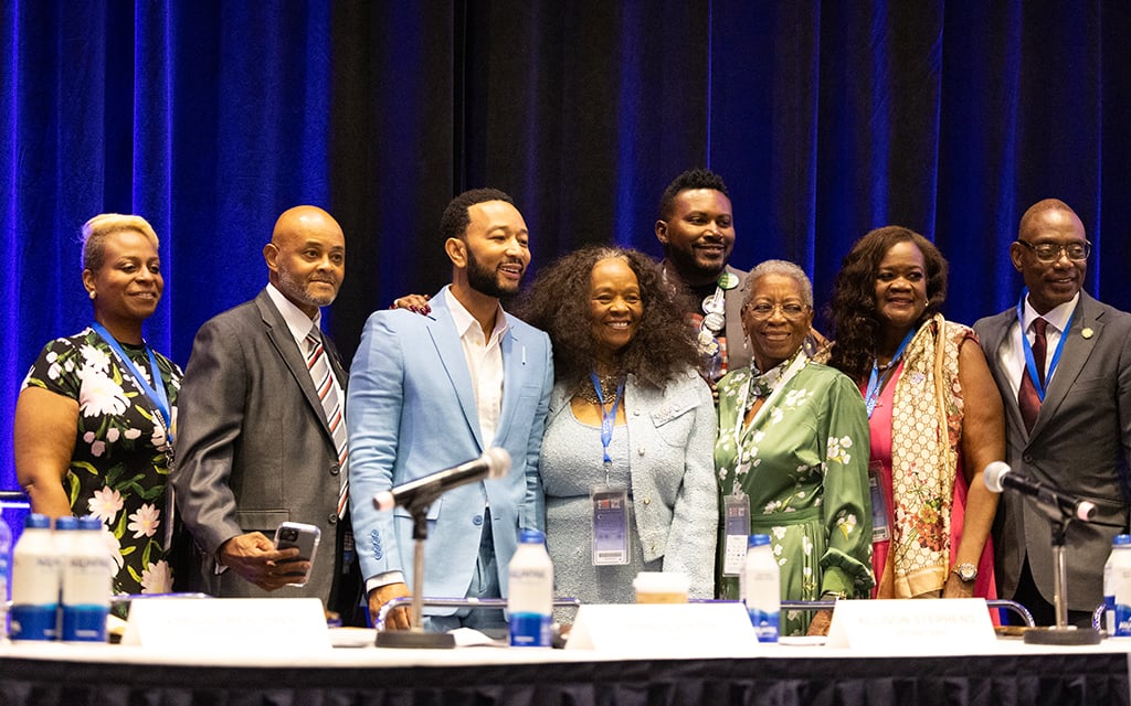 John Legend, a singer and songwriter, third from left, with leaders of Democrats’ Black caucus at the Democratic National Convention in Chicago on Aug. 21, 2024. (Photo by Kelechukwu Iruoma/Cronkite News)