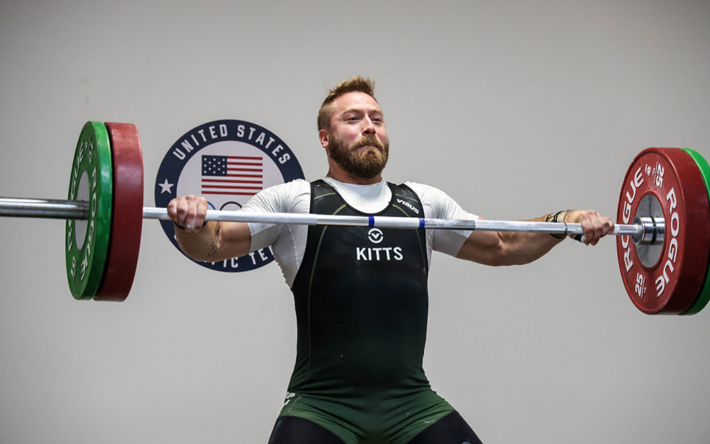 Two-time Olympic weightlifter Wes Kitts warms up before practice Tuesday at the USOPC high performance center. (Photo by Spencer Barnes/Cronkite News)