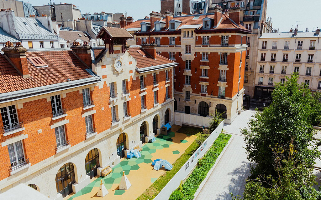 The central courtyard and green space located at the Caserne des Minimes affordable housing projects. Used as a city oasis for entertainment and enchantment (Photo by Savannah Bowie/Special for Cronkite News)