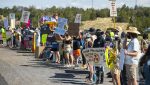 Protesters voice their opposition to uranium hauling from the Pinyon Plain Mine on Aug. 4, 2024. (Photo by Blake McCord via Grand Canyon Trust)