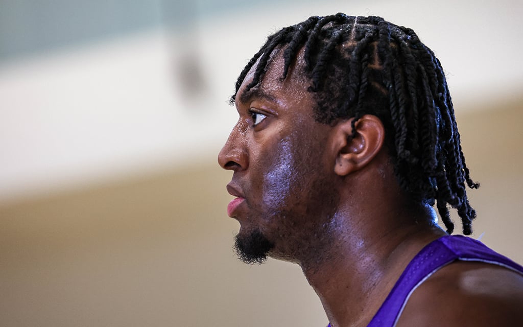 Side profile of Kyree Walker in a purple sports jersey at Sun Devil Fitness Complex.