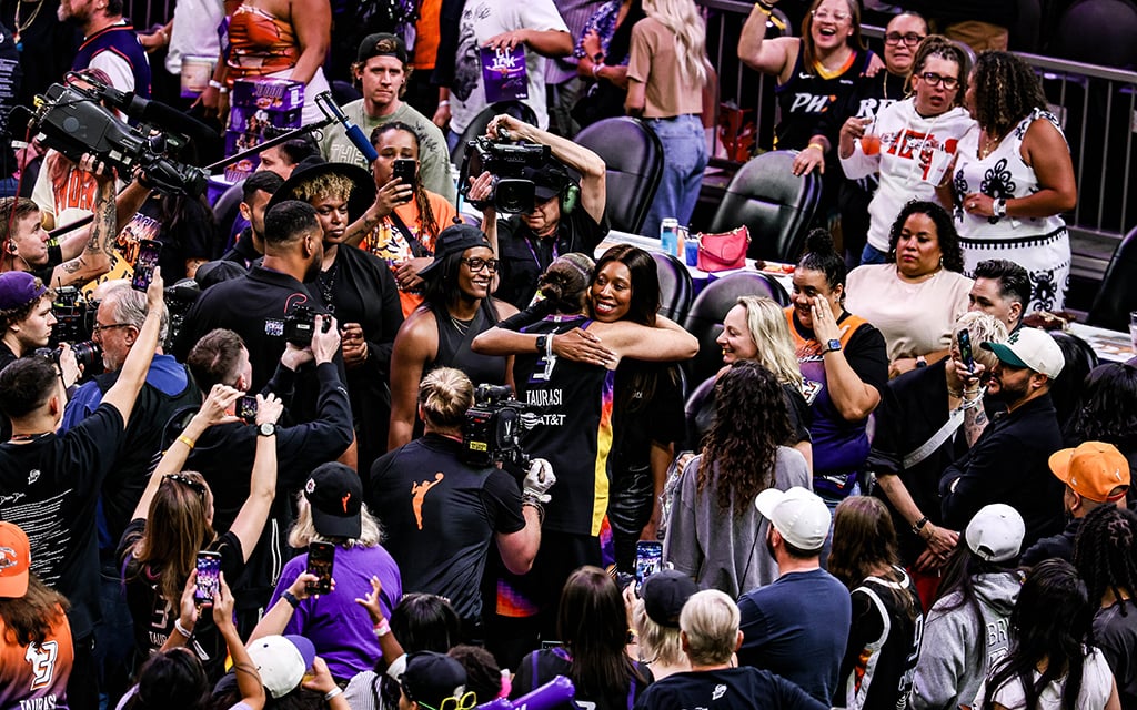 Following the game against the Storm on Thursday night, Diana Taurasi makes her rounds of hugging former teammates, friends and family. (Photo by Spencer Barnes/Cronkite News)