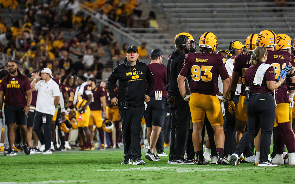 Kenny Dillingham standing during a timeout