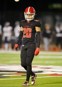 Brophy College Prep defensive back Cree Thomas standing on a football field.