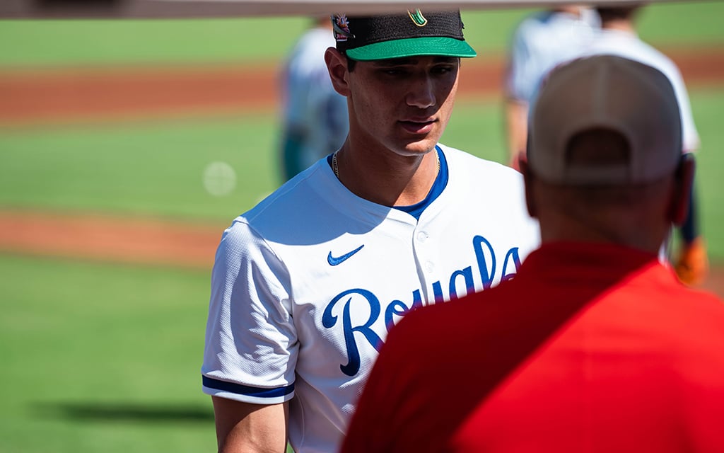 Jac Caglianone talks to vendor before batting practice.