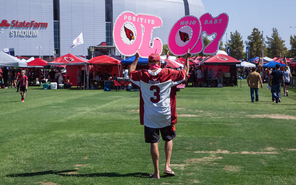 Cardinals fan with sign.