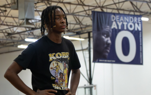 Kyi Kyi Miles wears a Kobe shirt watching at the Suns indoor facility